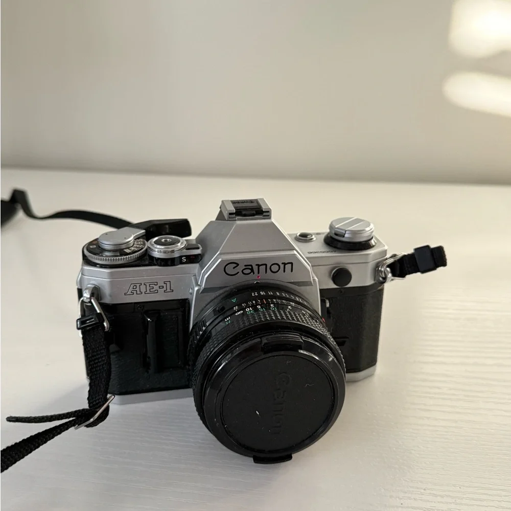 Canon AE-1 35mm film SLR camera with 50mm lens